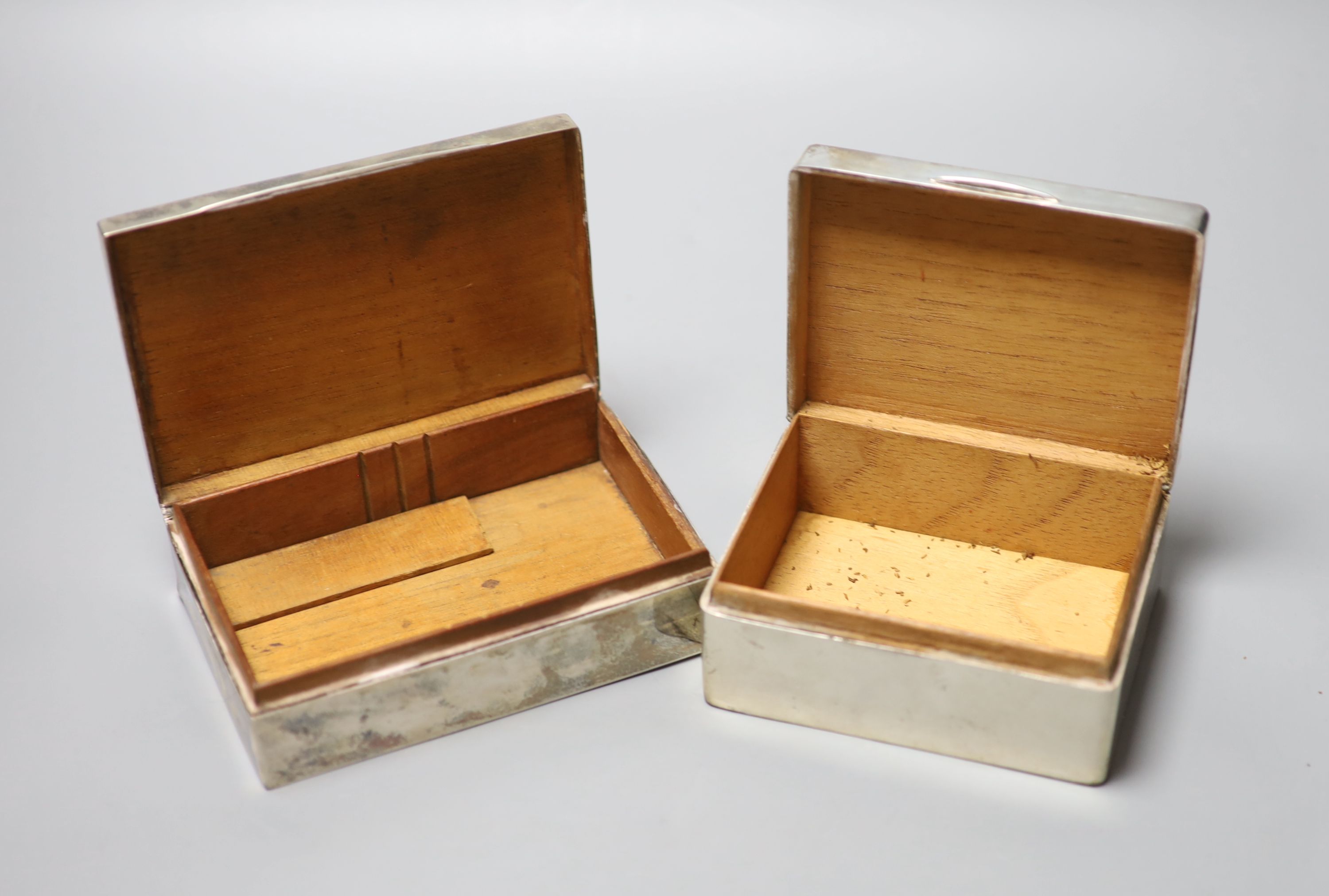 Two silver mounted cigarette boxes, largest 13.3cm.